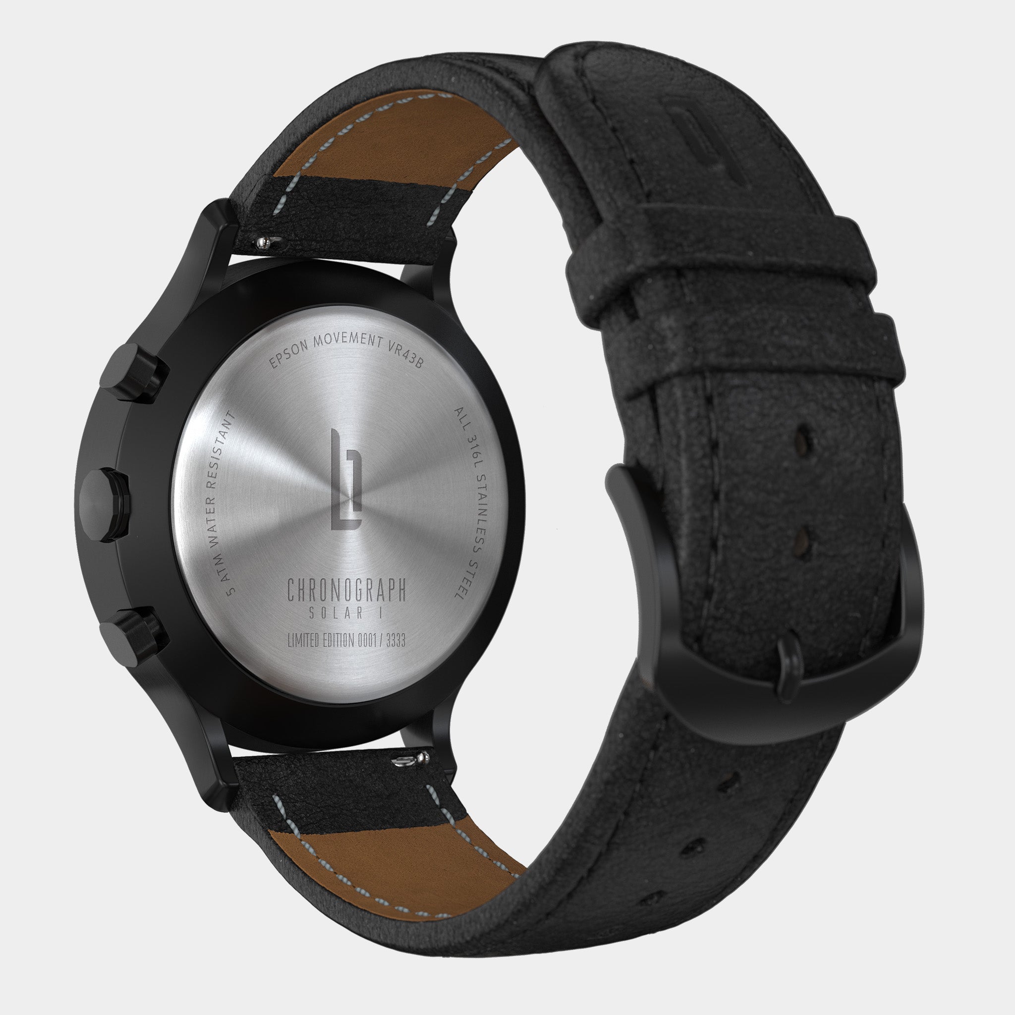 Back view of a stainless steel chronograph solar watch with black leather strap