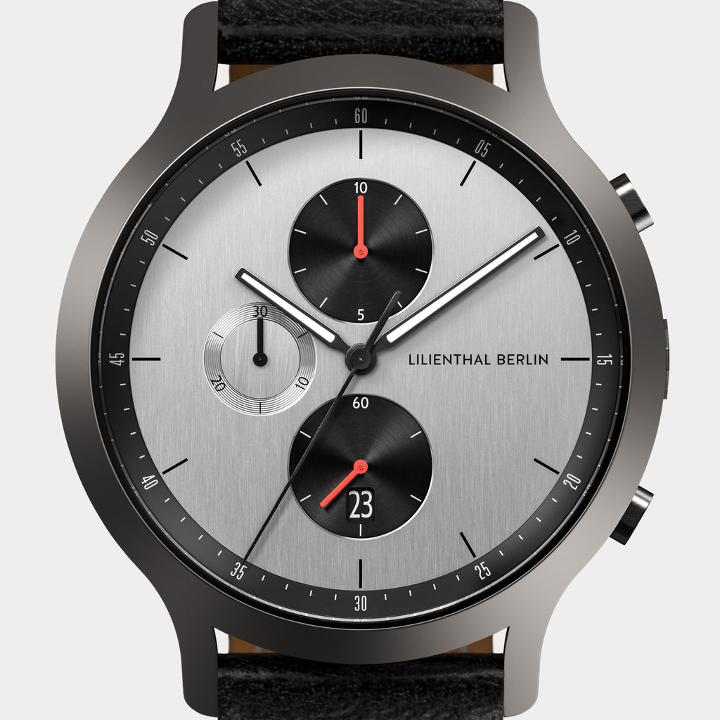 Modern silver chronograph watch with subdials, black strap, and Lilienthal Berlin logo.