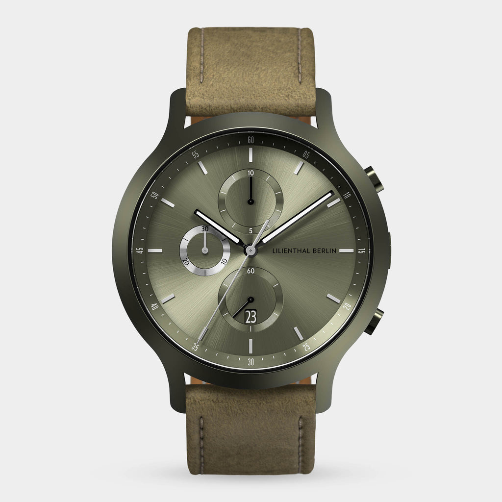 Olive green chronograph watch with subdials, date display, and brown leather strap