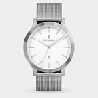 Minimalist silver mesh band watch with white dial and date display, modern design