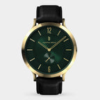 Gold case wristwatch with green dial, black leather strap, minimalist design